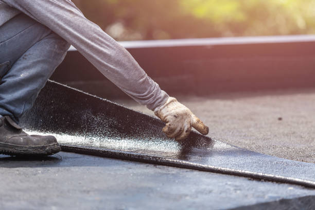 Professional Basement Waterproofing technician working in Vernon, IN